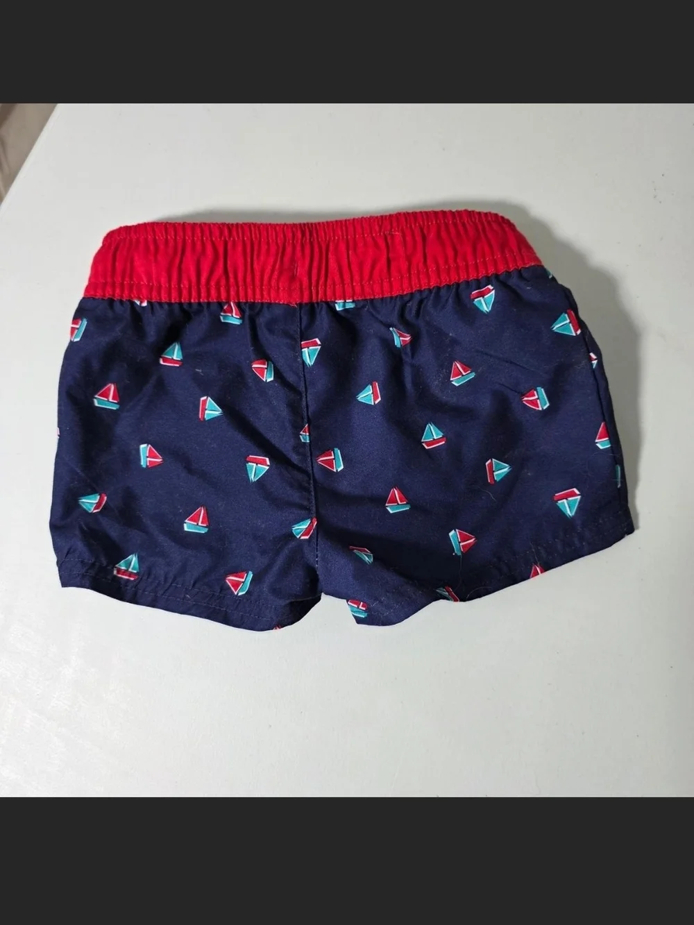 Navy Sailboat Print Toddler Swim Trunks with Red Waistband